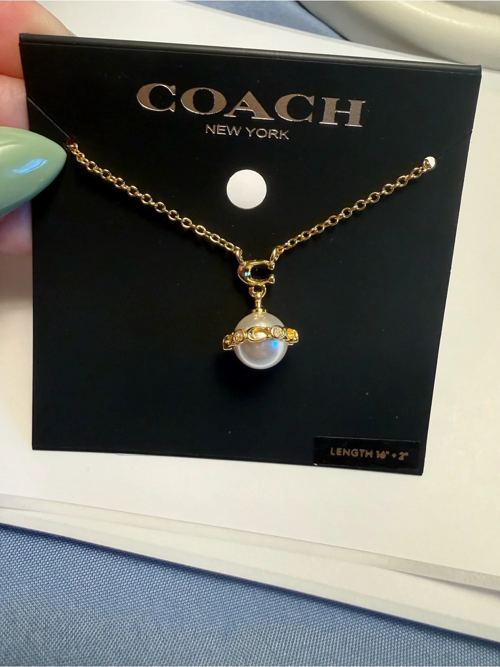 Coach Gold-Tone Pearl Pendant Necklace with Crystal Accents
